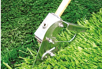 Coupe-bordure pour gazon synthétique